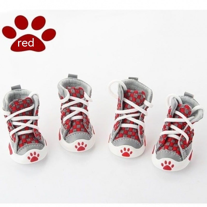 Set of four red and gray checkered pet shoes with white laces on a white background.. bishop X 