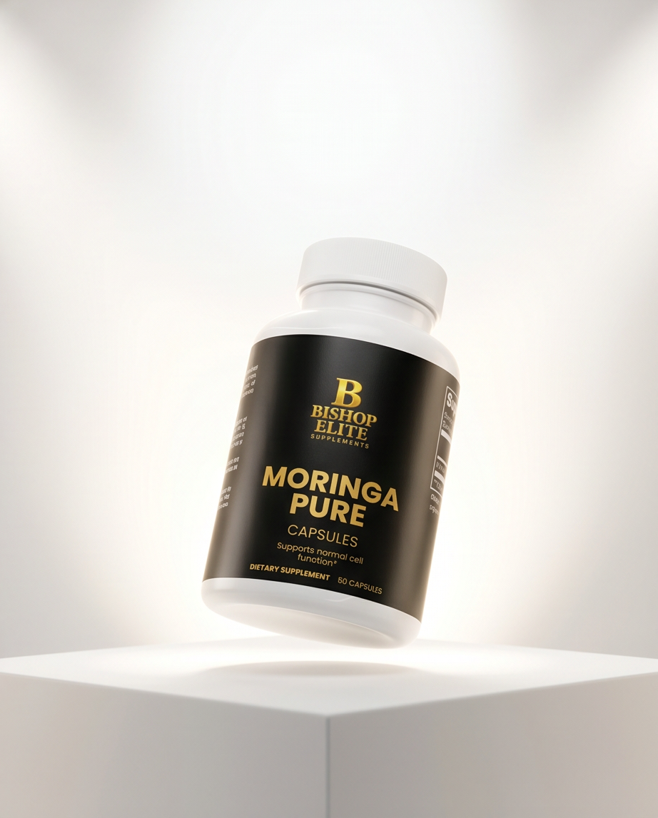 A white bottle of Bishop Elite Moringa Pure dietary supplement capsules, featuring a black label with gold lettering, displayed on a white pedestal against a bright, clean background. Bishop Elite Supplements 